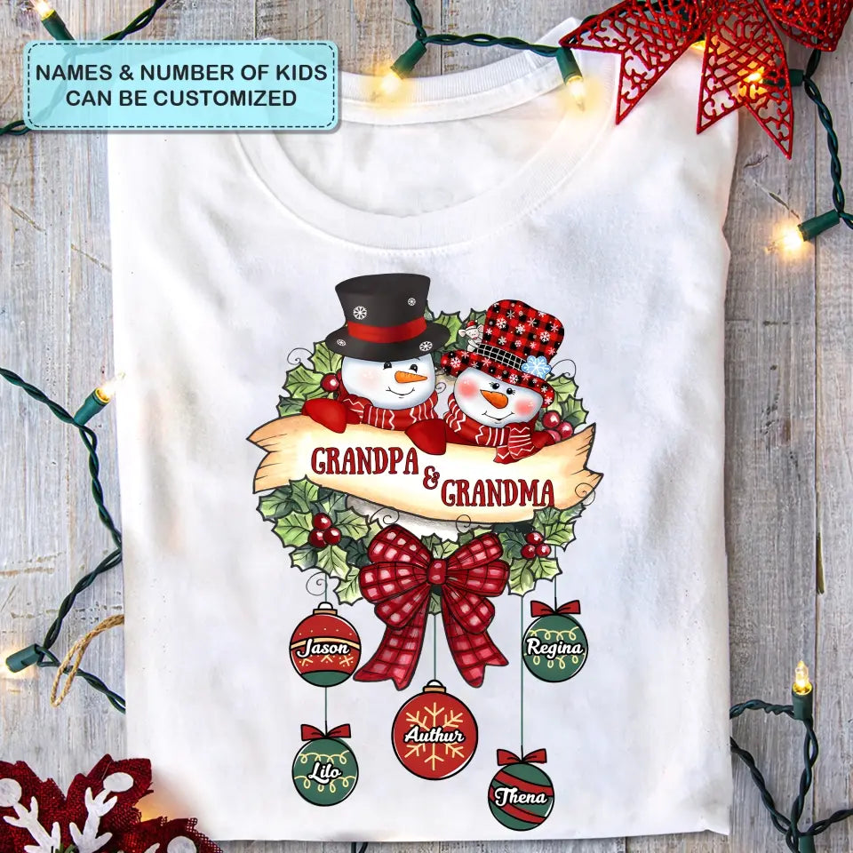 Snowman Grandma And Grandpa- Personalized Custom T-shirt - Christmas Gift For Grandma, Mom, Grandpa, Dad, Family Members