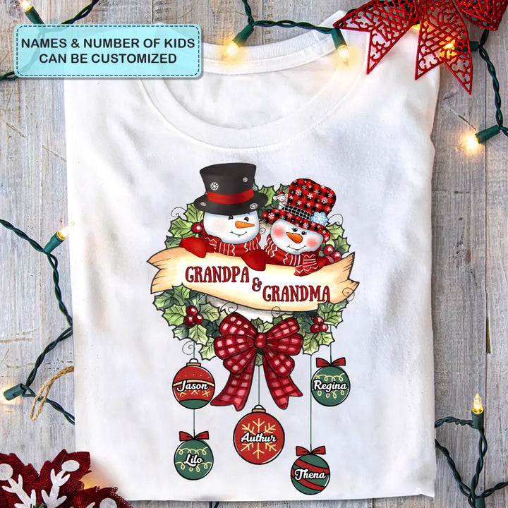 Snowman Grandma And Grandpa- Personalized Custom T-shirt - Christmas Gift For Grandma, Mom, Grandpa, Dad, Family Members