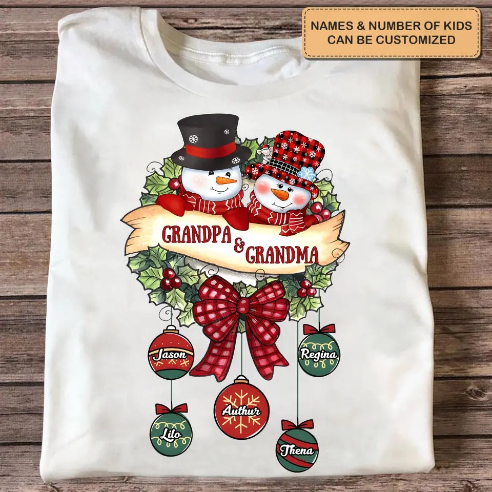 Snowman Grandma And Grandpa- Personalized Custom T-shirt - Christmas Gift For Grandma, Mom, Grandpa, Dad, Family Members